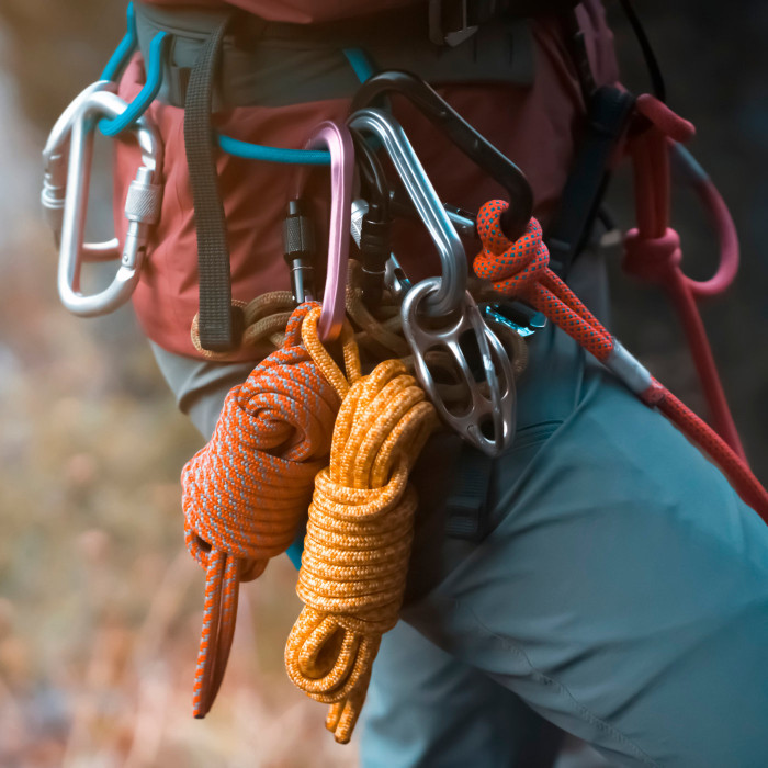 Climber with safety equipment